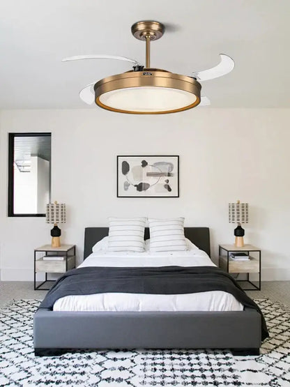 Brass-finished modern ceiling fan light with white translucent reversible blades and circular light fixture for living room