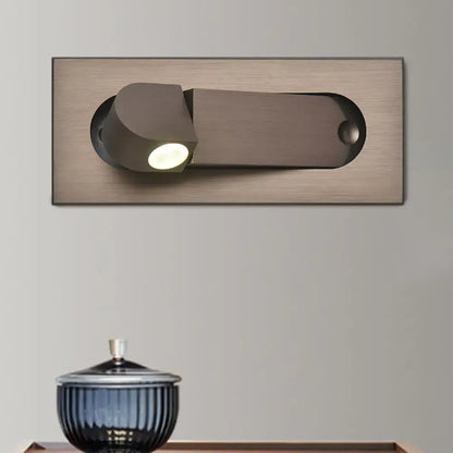 Modern bronze coffee wall lamp with brushed bronze finish and adjustable head for natural warm bedroom lighting