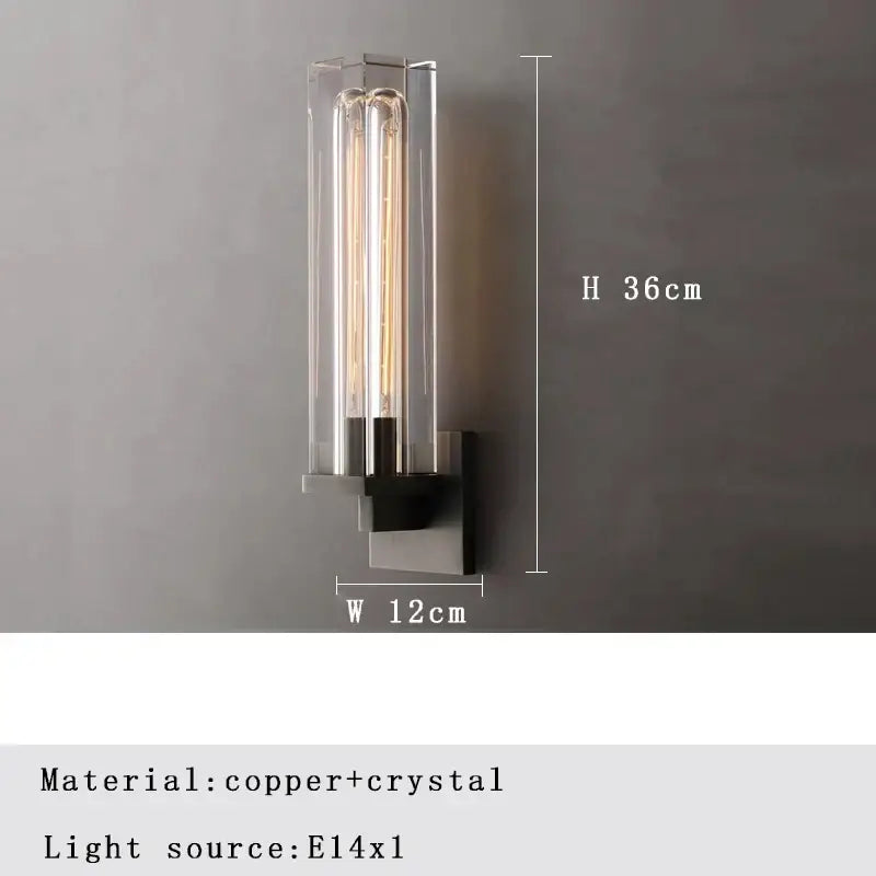 Modern wall lamp with decorbites bronze copper base and crystal enclosure housing three edison-style bulbs for bedroom lighting