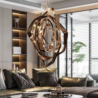 Modern bronze geometric art pendant chandelier with interlocking polished gold rings for dining room decorbites pendant light