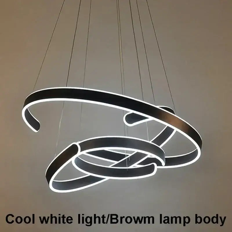Modern bronze geometric black and brown pendant light fixture with cool white led illumination for dining room
