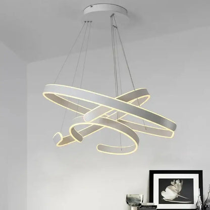 Modern white LED pendant light with interlocking bronze geometry circle rings and warm glow for living room