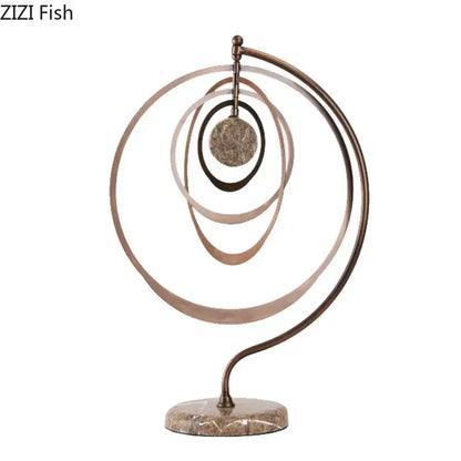 Modern bronze intertwined geometry sculpture with concentric rings and textured disc on marble base desk decoration decorbites geometry sculpture