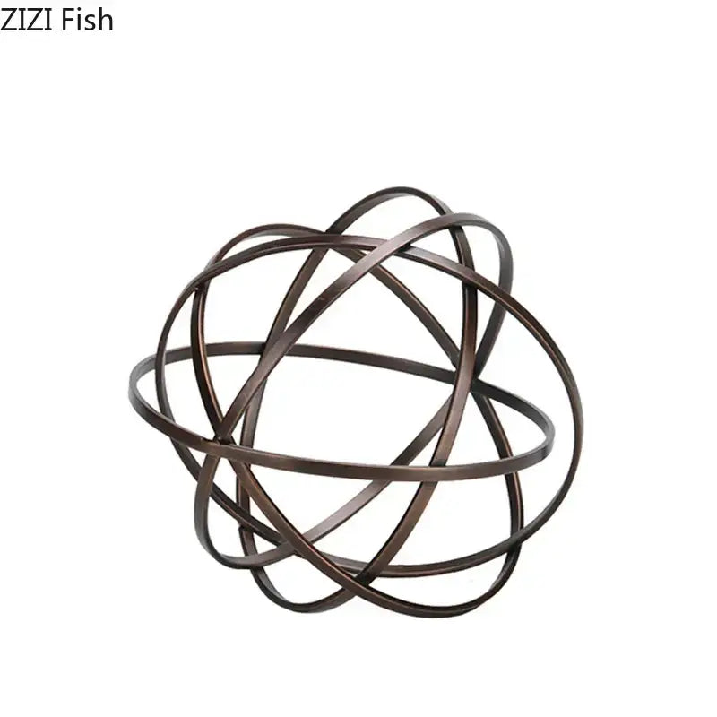 Modern bronze intertwined geometry sculpture with bronze finish metal sphere on marble base desk decoration by decorbites
