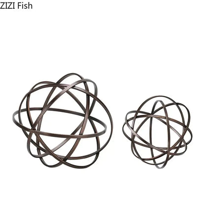Modern bronze intertwined geometry sculpture with bronze-finished metal wire spheres and marble base for desk decoration