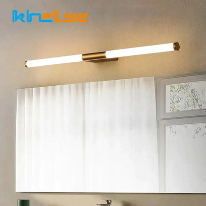 Modern bronze led mirror front wall lamp with gold-toned cylindrical led tubes and brushed metal accents by decorbites bronze led