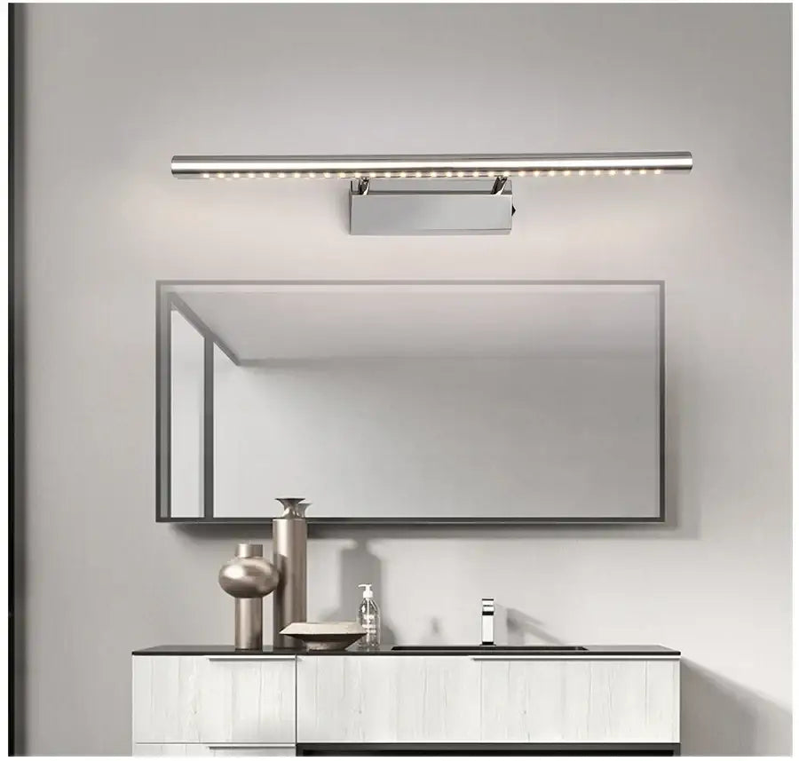 Modern bronze led mirror light featuring a chrome-finished elongated design with integrated mirror reflector by decorbites