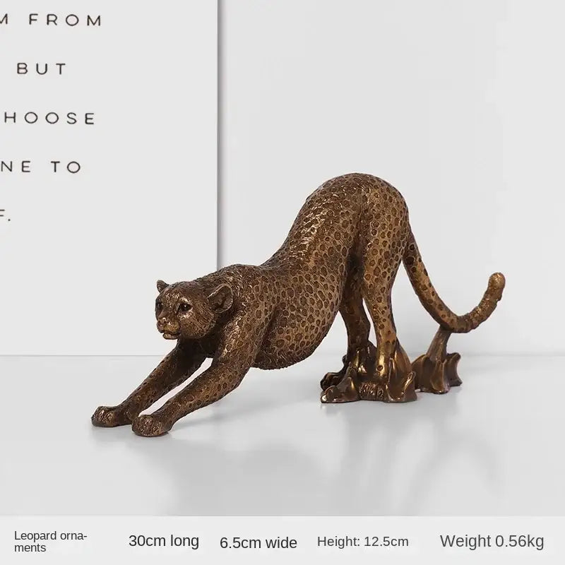 Modern bronze leopard statue with detailed spotted pattern and sleek elongated body for living room decorbites leopard statue