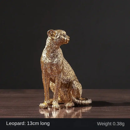 Golden bronze leopard statue with intricate texture and seated posture perfect for living room decorbites leopard statue