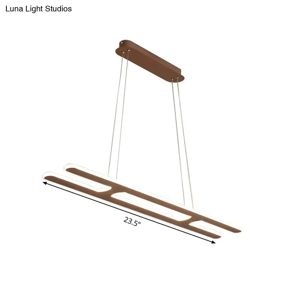 Modern bronze rectangular pendant light with sleek elongated design and white light led bulb included for kitchen use
