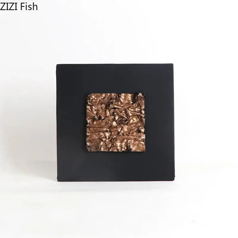Black square wall art with textured metallic copper center featuring decorbites gilded fabric wall decor for living room