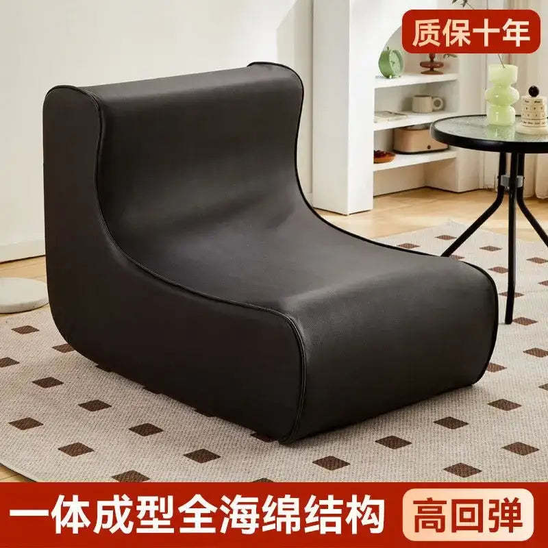 Modern brown and black faux leather cozy sofa chair with sleek design and high-resilience foam for living room comfort
