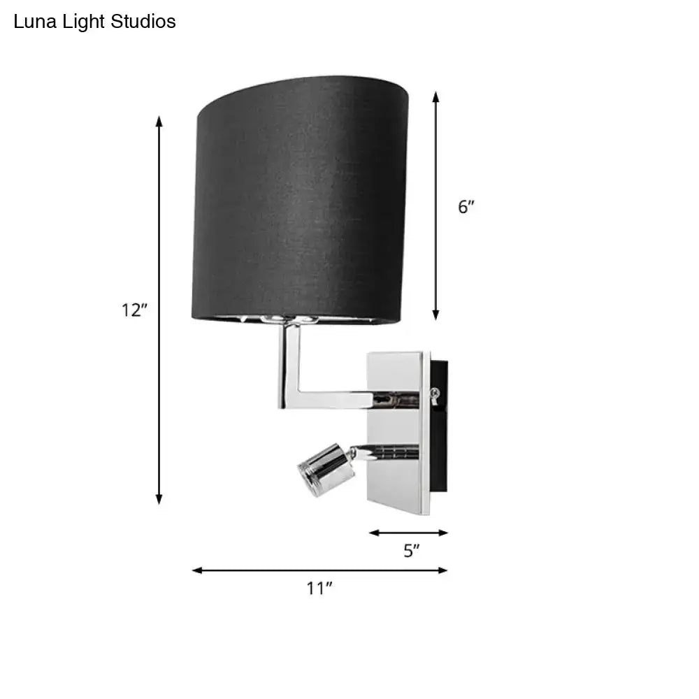 Black fabric shade wall light mounted on chrome finished sconce with adjustable spotlight for modern bedroom use