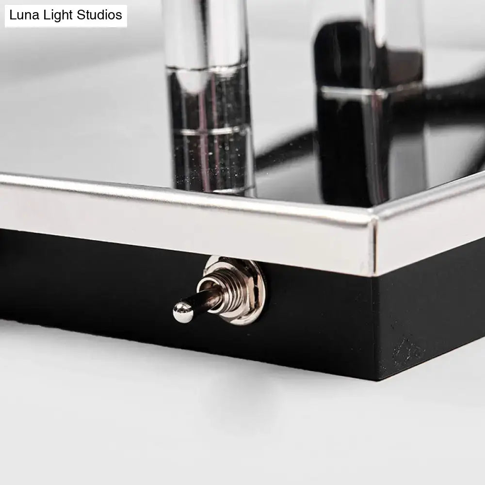 Black and silver metallic desk lamp base with toggle switch for modern brown fabric and chrome wall light bedroom sconce