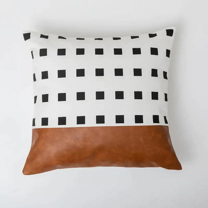 Modern brown faux leather and geometric pillow cover with white grid fabric top and tan faux leather bottom for decorbites decor