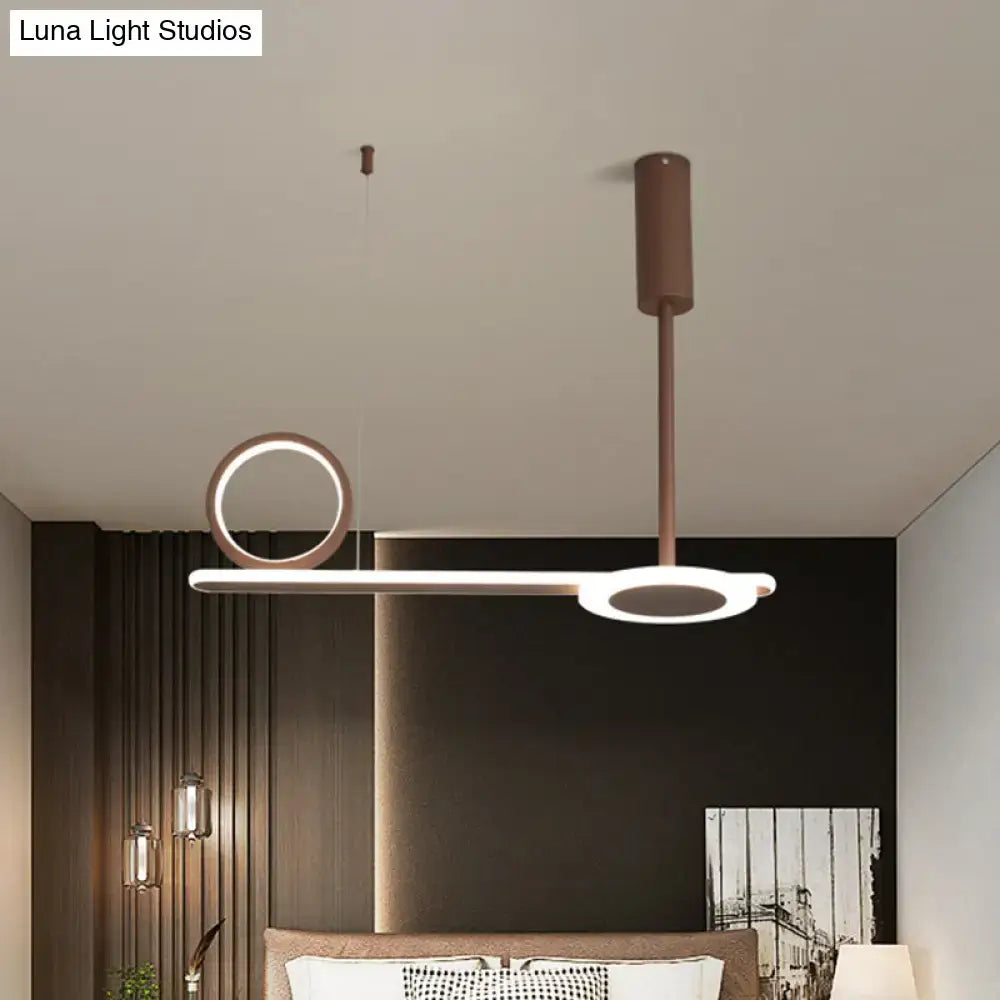 Modern brown metal ring hanging light with sleek bronze finish and two circular led rings in a hanging light kit