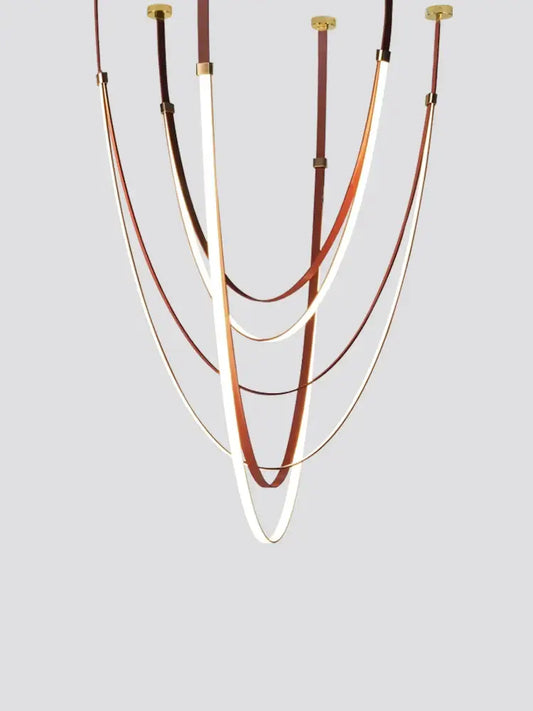 A modern brown and white decorbites designer belt light chandelier with curved bands and gold hardware for dining room