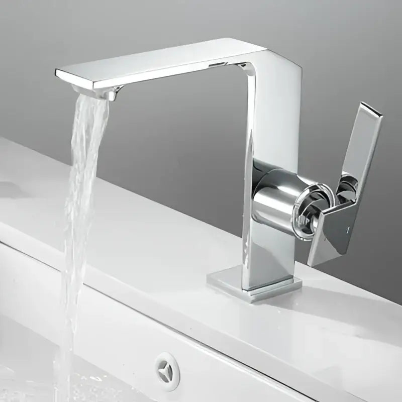 Modern chrome finished basin faucet with sleek angular design and waterfall spout in decorbites brush gold style