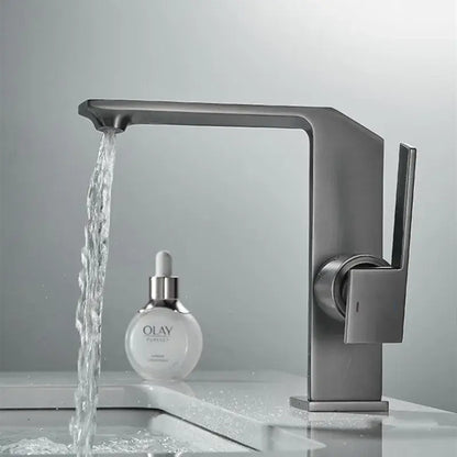 Modern matte gray basin faucet with sleek angular design and single lever handle complementing decorbites brush gold style