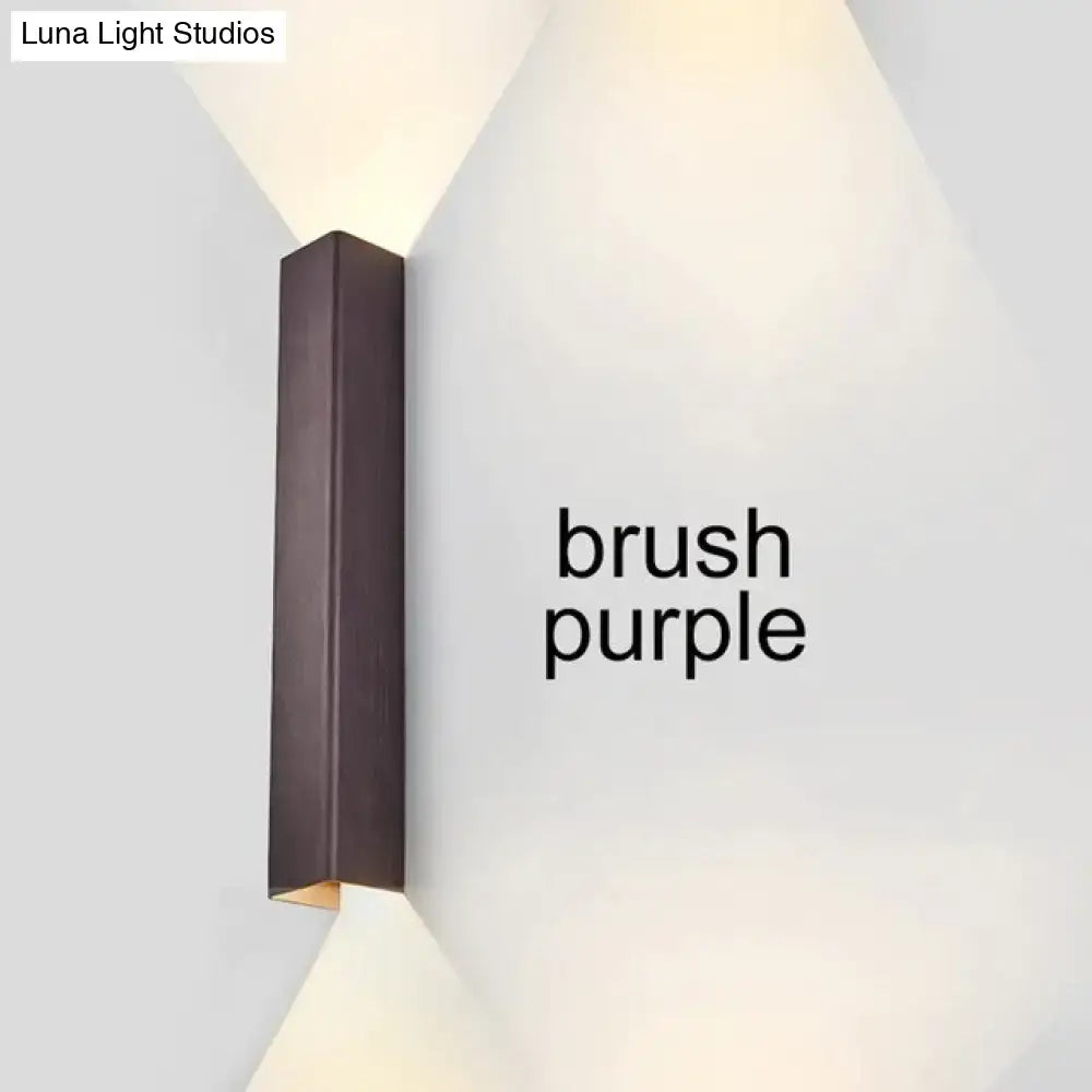 Modern brushed aluminum rectangular wall sconce in brush purple with sleek design for bedroom ambient light