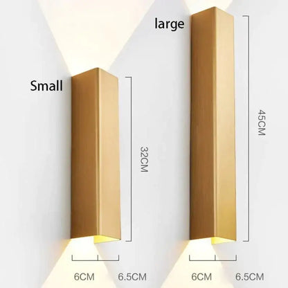 Modern brushed aluminum rectangular wall sconces with gold finish available in small and large sizes for bedroom ambient light