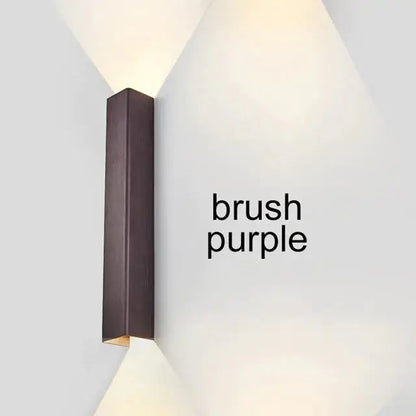 Modern brushed aluminum rectangular wall sconce in purple with sleek design for bedroom ambient lighting