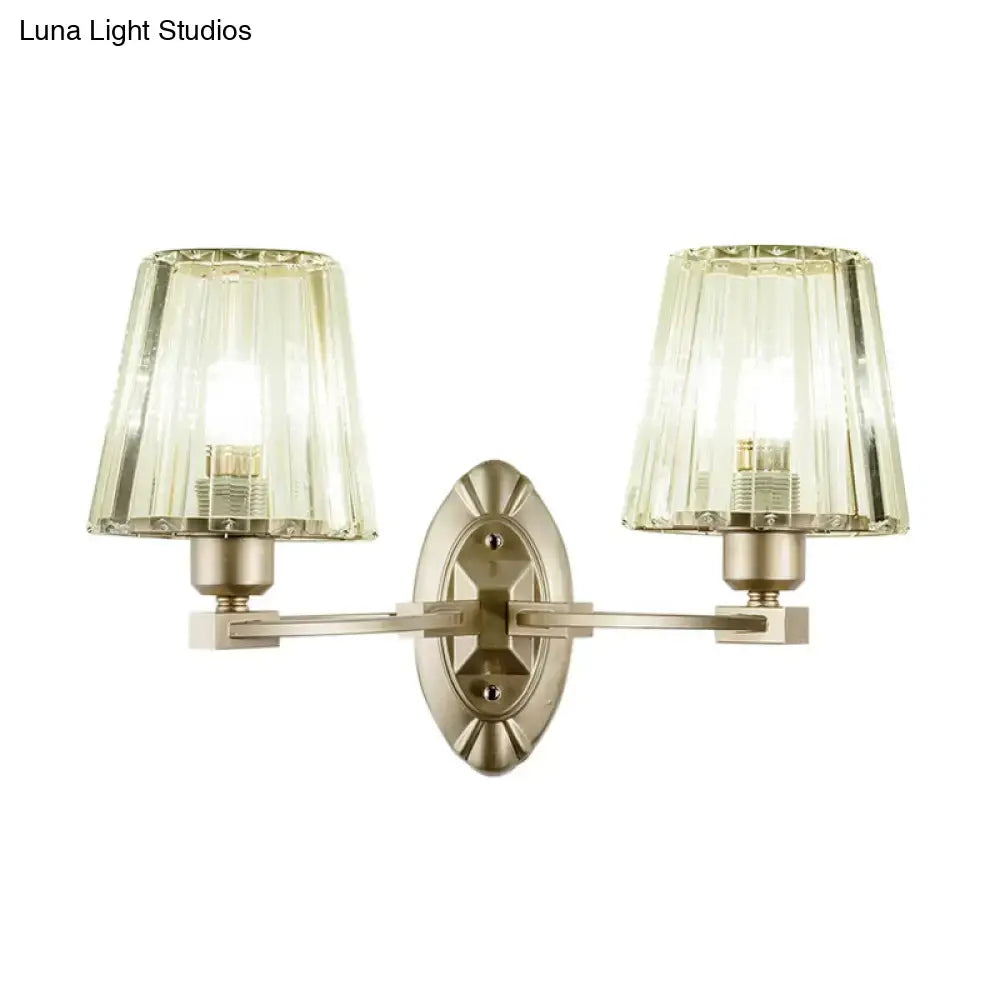 Modern brushed nickel two-light wall sconce with fluted translucent glass shades wall light fixture for bedroom use