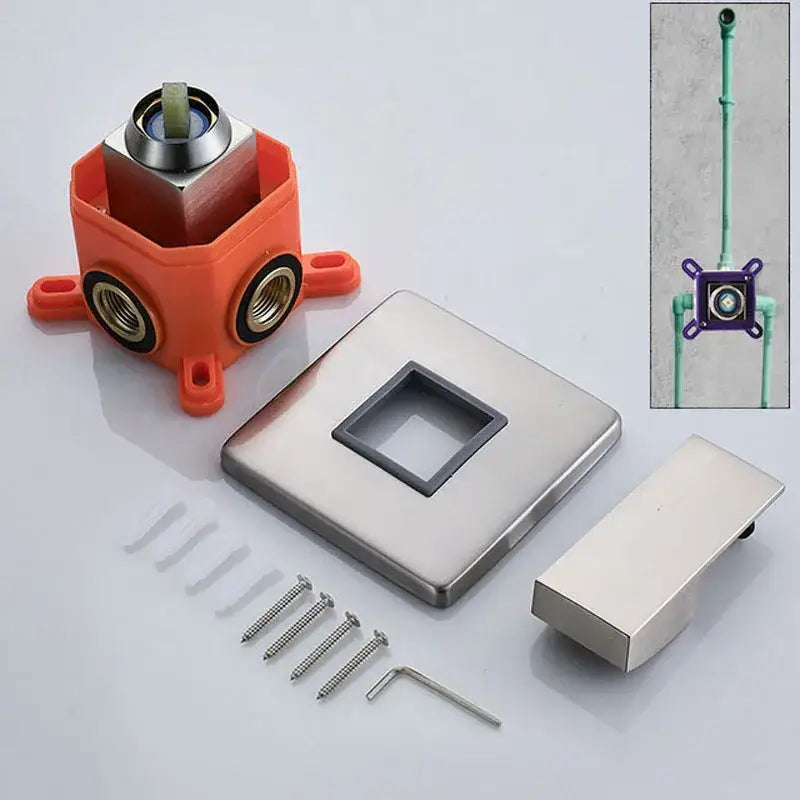 Modern brushed brass and orange shower mixer valve with stainless steel square deck plate and black trim opening