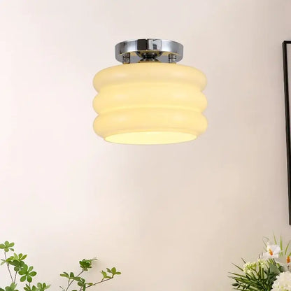 Modern brushed brass creamy glass iron ceiling light with cream-colored ribbed glass and chrome mounting base for bedroom decorbites creamy glass