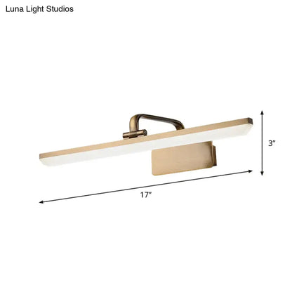 A sleek 17-inch modern brushed brass led vanity sconce with minimalist rectangular design for bathroom walls