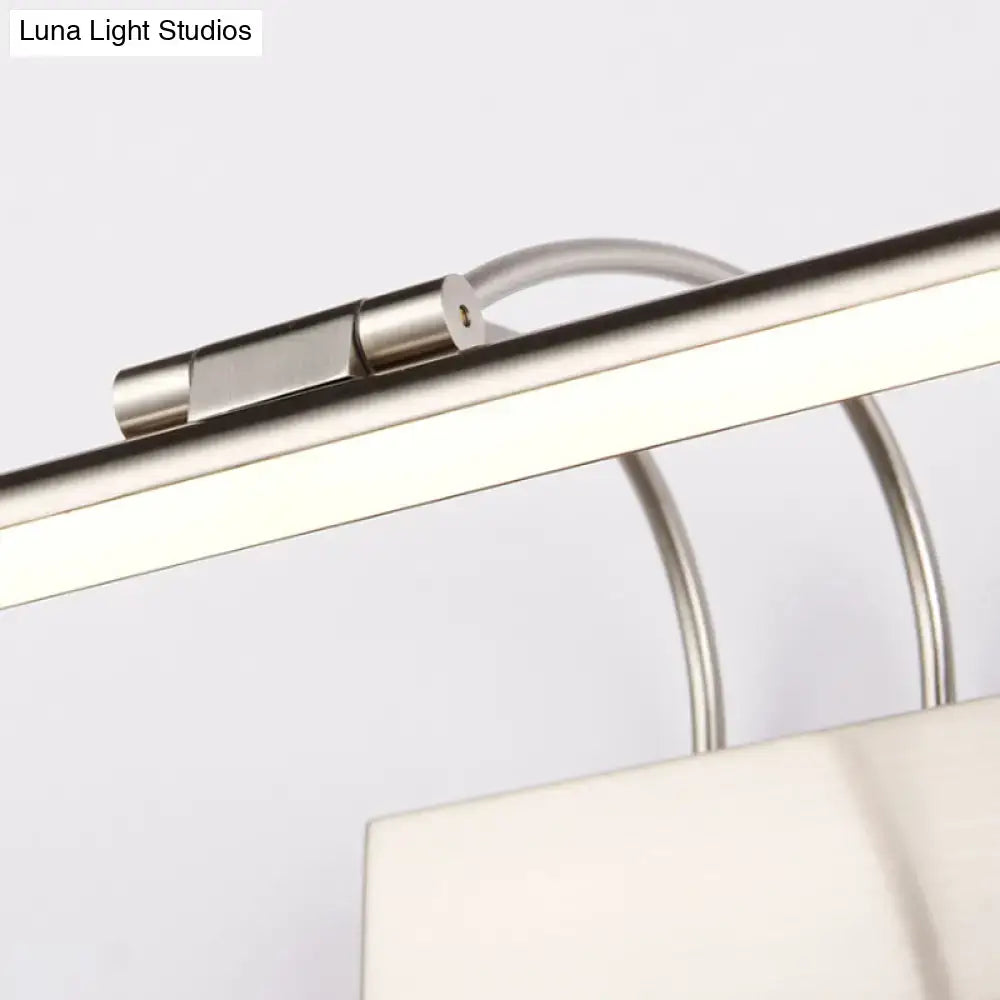 Modern brushed brass led wall light with sleek cylindrical connector and curved metallic support arms for bathroom use