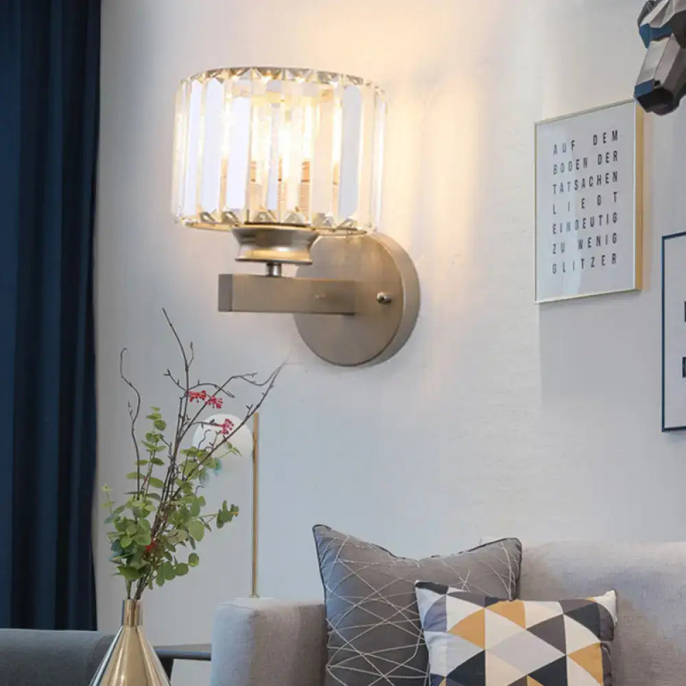 Modern brushed brass nickel drum sconce light with cylindrical crystal shade suitable for 220v-240v and 110v-120v use
