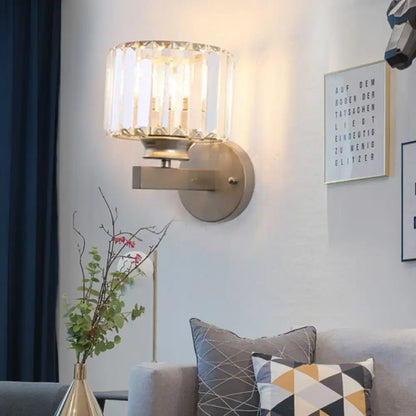 Modern brushed brass nickel drum sconce light with cylindrical crystal shade suitable for 220v-240v and 110v-120v use