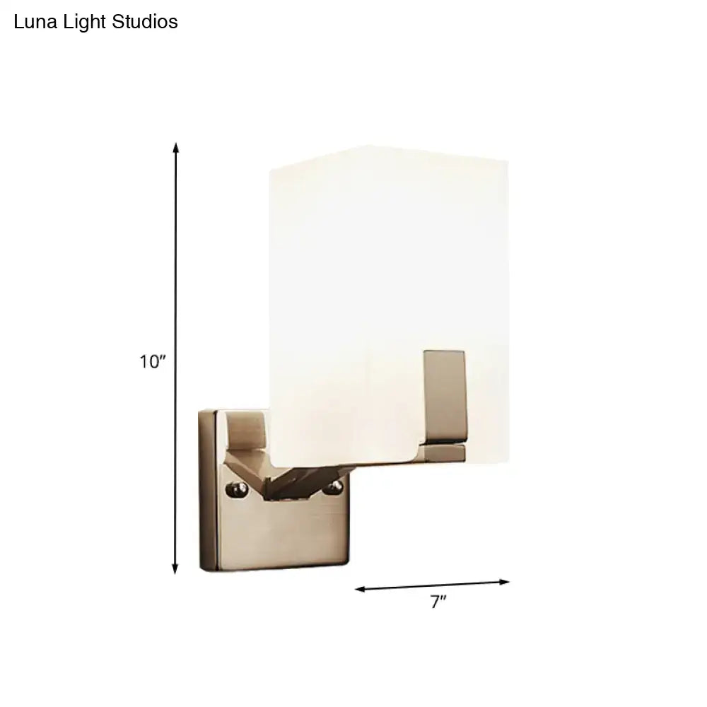 Modern brushed nickel wall sconce with rectangular frosted glass shade light type for bedroom lighting