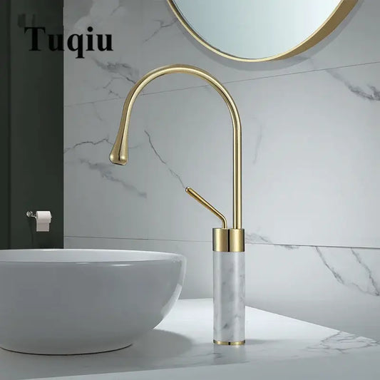 Modern brushed gold brass single-handle bathroom sink faucet with marble-patterned cylindrical base and brushed gold finish
