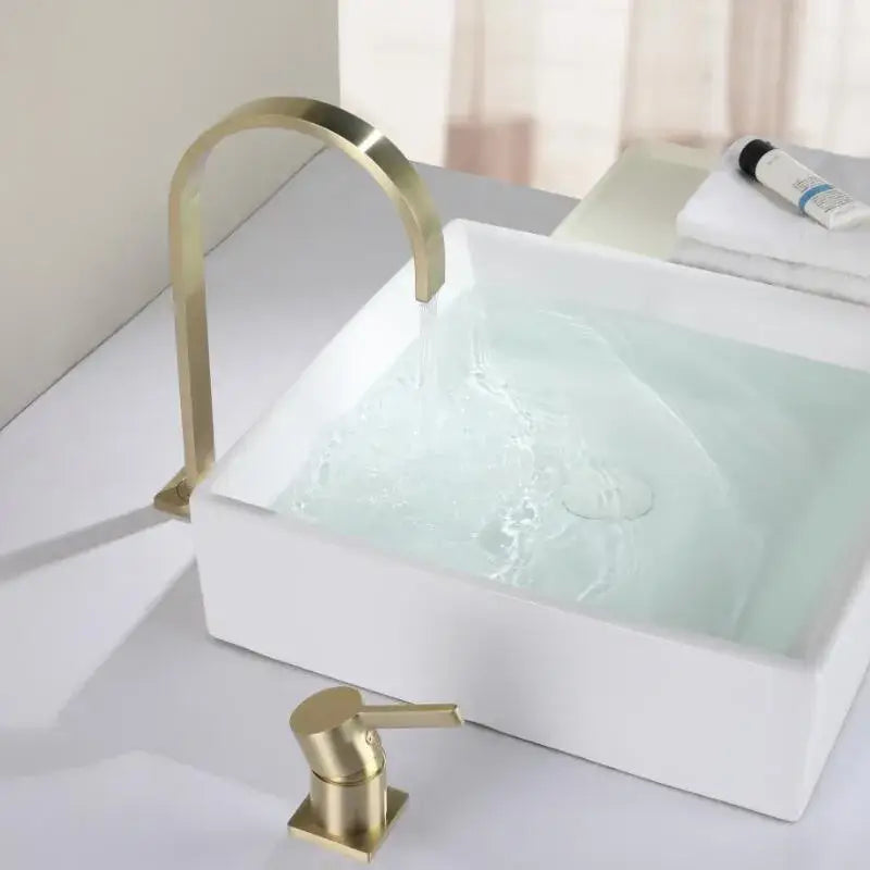 Modern brushed gold basin faucet with arched sleek design showcasing decorbites brushed gold finish for bathroom use