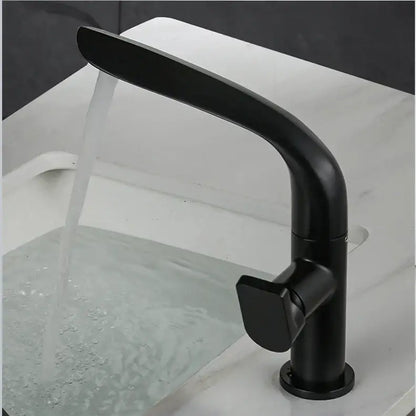 Modern brushed gold basin faucet with a black matte curved spout and rectangular handle decorbites brushed gold design