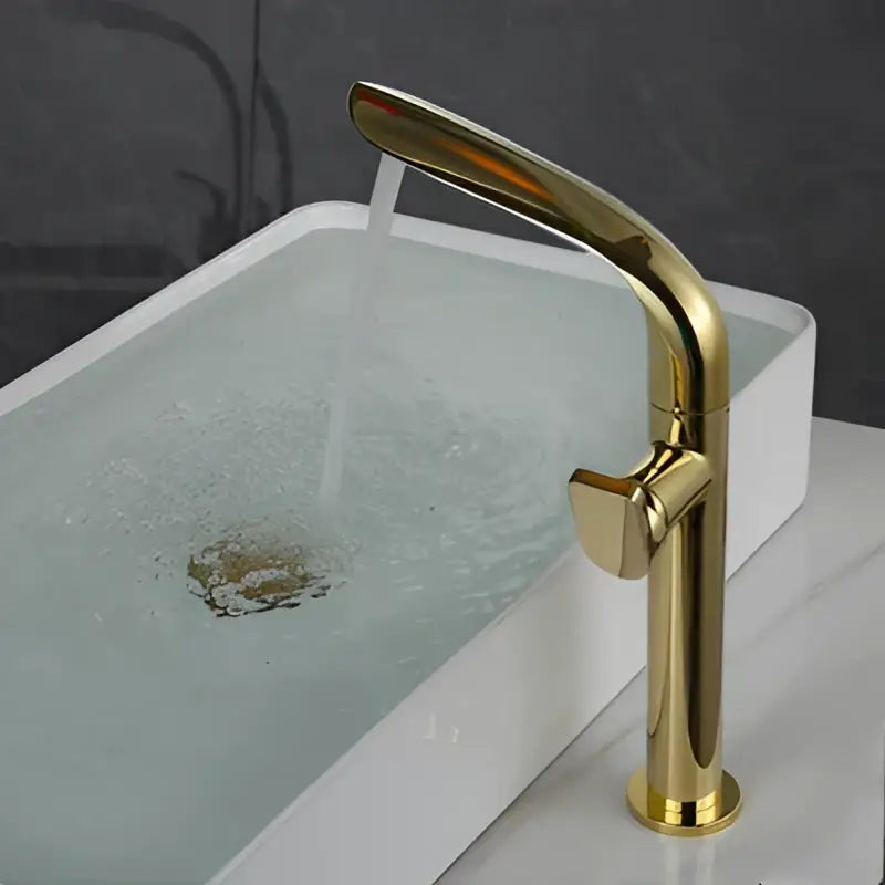 Modern brushed gold basin faucet with high arc mixer tap featuring sleek single-handle design by decorbites brushed gold