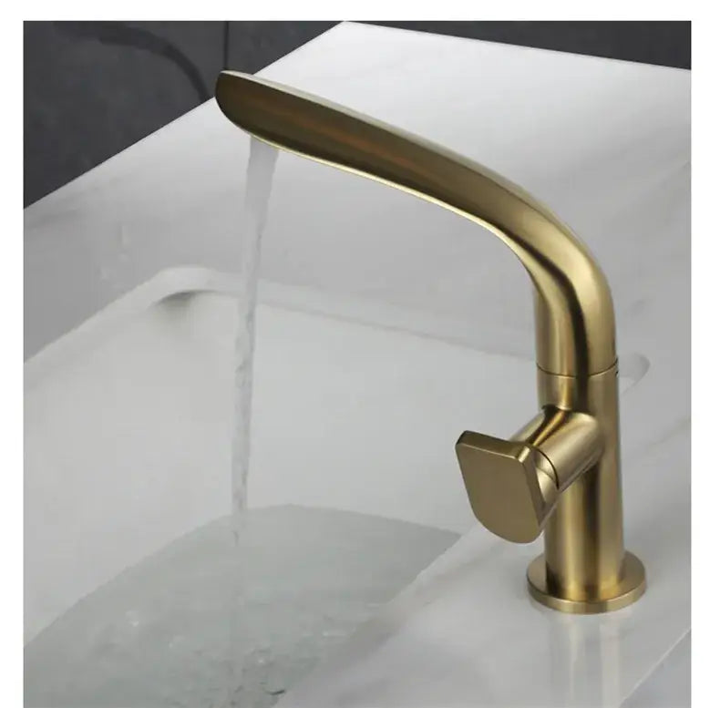 Modern brushed gold basin faucet with sleek curved spout and minimalist design from decorbites brushed gold collection