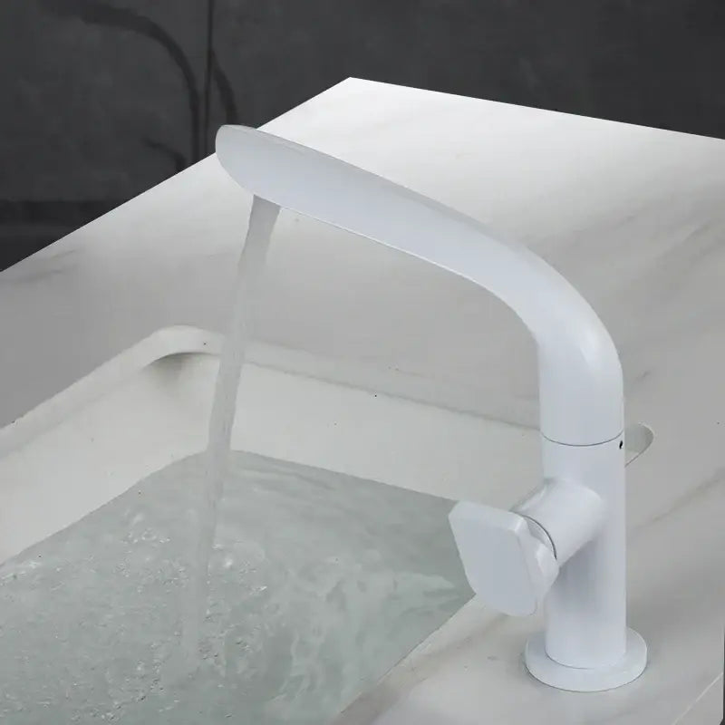 White modern basin faucet with sleek curved spout and minimalist design in decorbites brushed gold finish