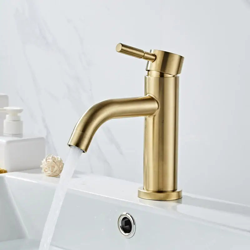 Modern brushed gold basin faucet with single handle mixer tap in a sleek brushed metal finish by decorbites brushed gold