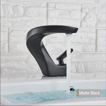 Matte black modern basin faucet with sleek curved design complementing decorbites brushed gold mixer tap bathroom decor