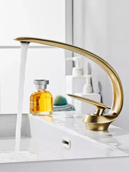 Modern brushed gold basin faucet with sleek curved design in brushed gold ideal for bathroom sink decorbites brushed gold
