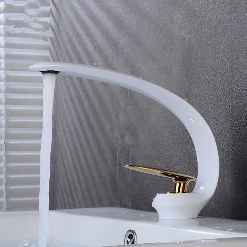 Modern brushed gold basin faucet with white ceramic body and curved spout by decorbites brushed gold collection