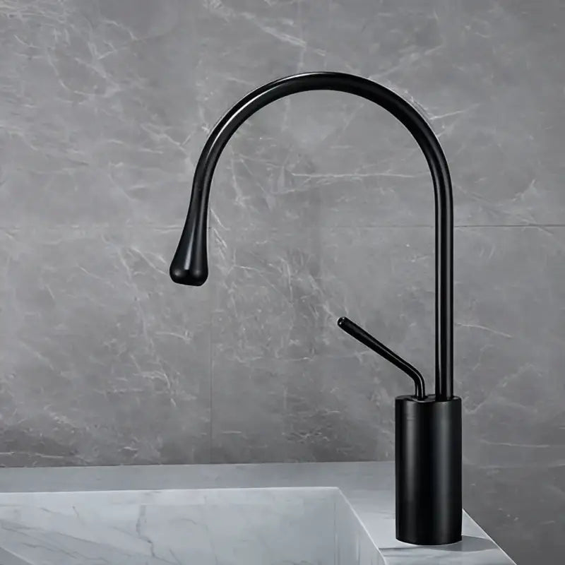 Modern brushed gold basin faucet with black matte curved spout and cylindrical base for kitchen decorbites brushed gold