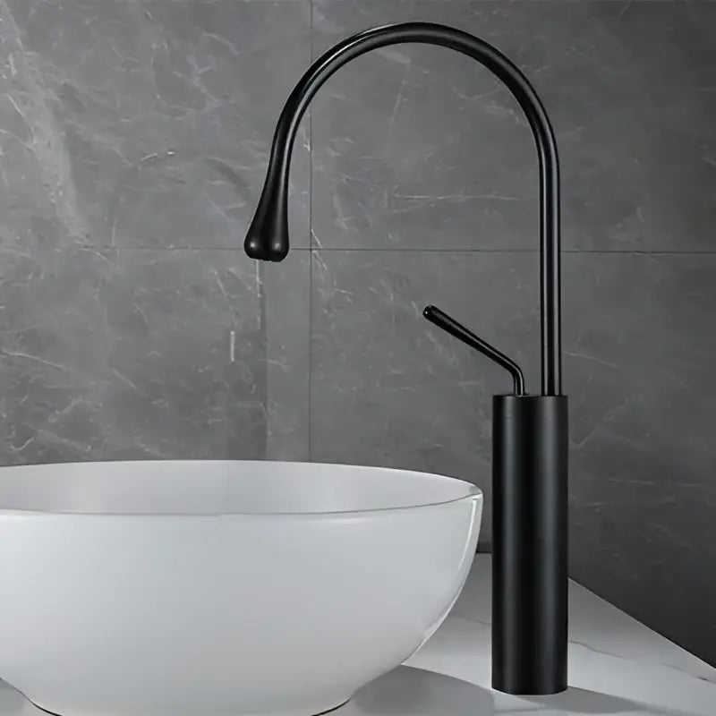 Black matte basin faucet with curved spout and cylindrical base for decorbites brushed gold modern kitchen use