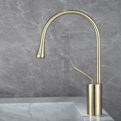 Modern brushed gold basin faucet with sleek curved spout and cylindrical base for kitchen decorbites brushed gold style