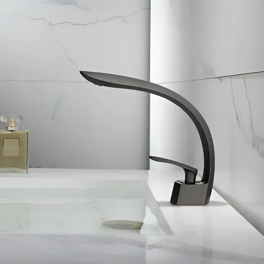 Modern matte black basin faucet with sleek curved design and minimalist aesthetic for decorbites brushed gold basin