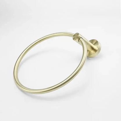 Brass-finished circular towel ring with sleek minimalist design and smooth edges in modern brushed gold bath hardware set
