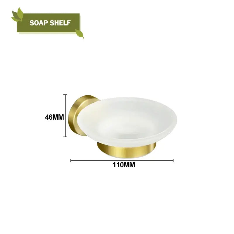 Modern brushed gold bath hardware set featuring a gold metal soap dish with a frosted white glass bowl